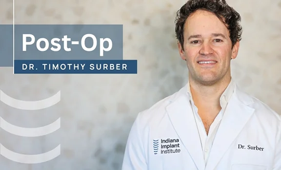 Dr. Timothy Surber is presenting dental implant post-op care instructions at the Indiana Implant Institute